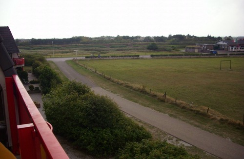 Buren Apartment | Ameland - apartment with balcony to the south side with a view of meadows and the village of Buren