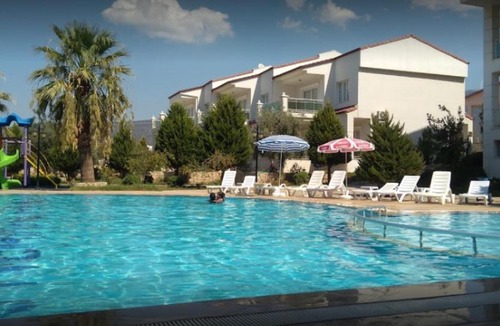 Akbuk Apartment | Modern Flat with Shared Pool and Sauna in Didim