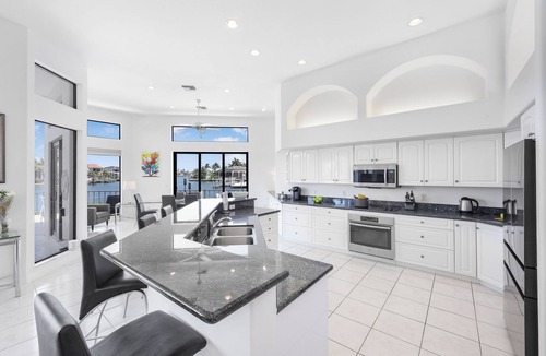 Marco Island House | Waterfront property with stunning views within walking distance to the beach.