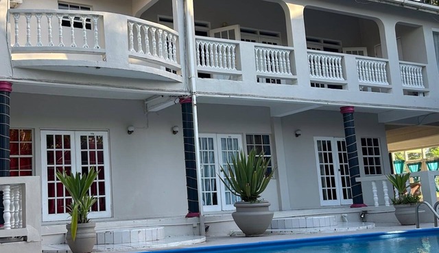 Aparthotel 5-minutes away from beach w/AC, Wi-Fi, & pool view in RodneyBay in Rodney Bay