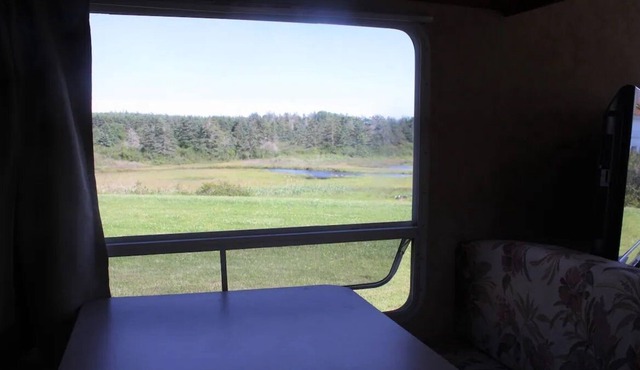 Fully equipped camper on Mavillette River. Close to the beach. (pet friendly) in Mavillette